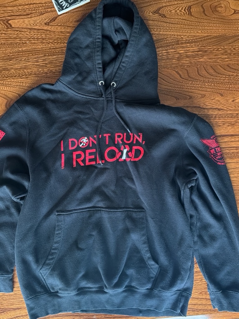 Black Hoodie with Red 'I Don't Run, I Reload' Graphic